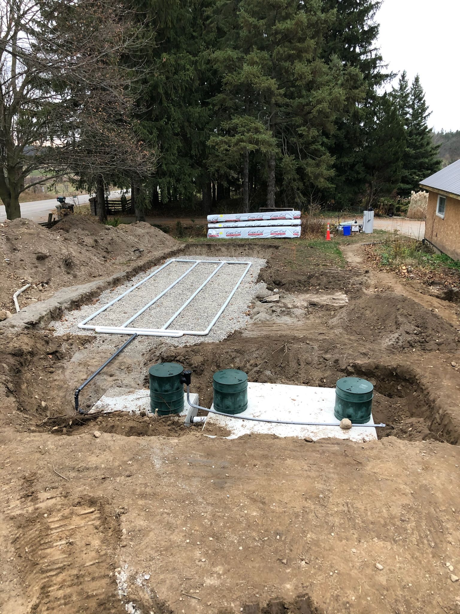 Country Estates Construction septic installation: septic system installation with tanks and a new septic bed laid out