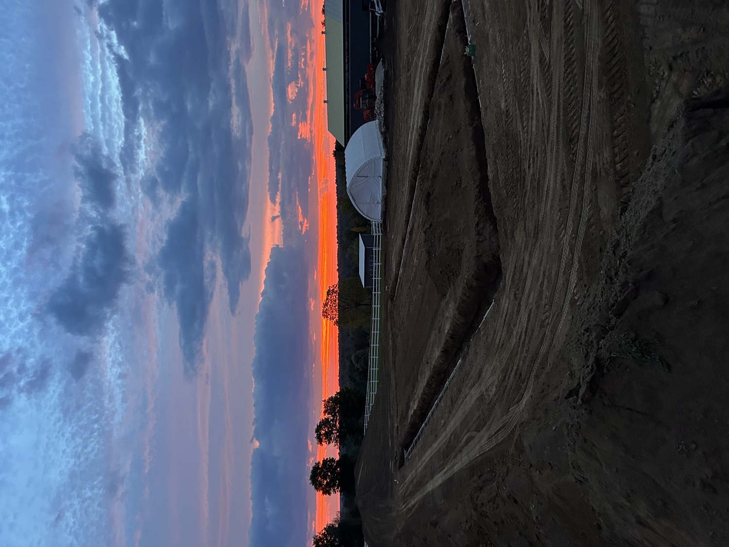 Excavated site at sunset