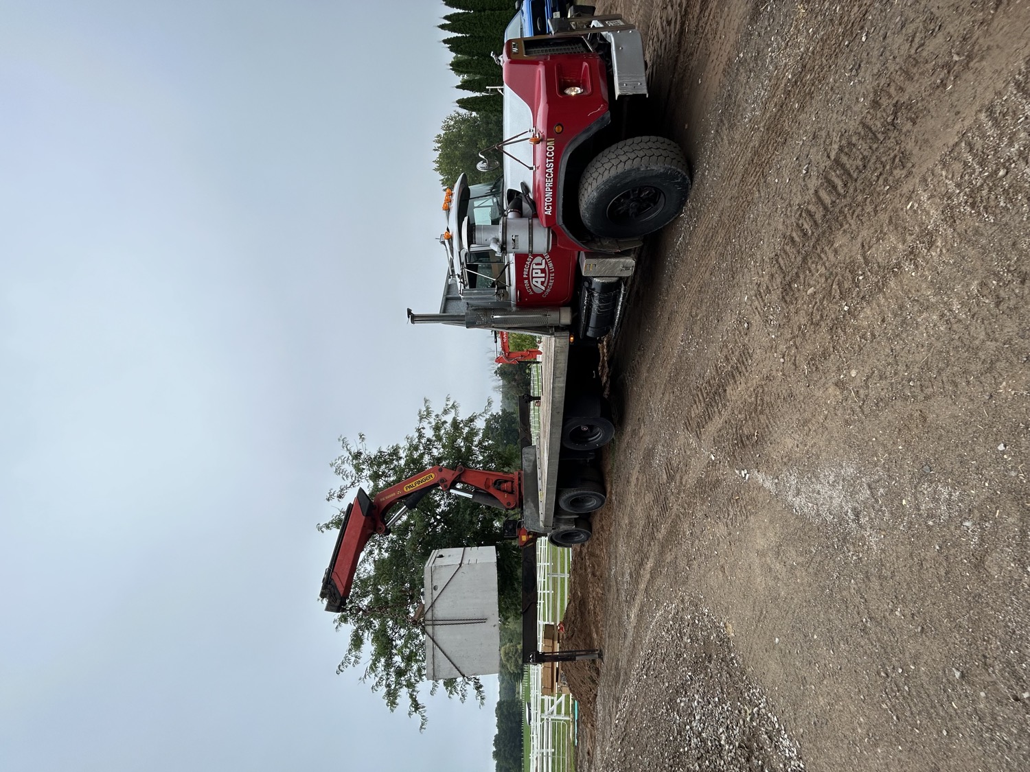 Precast concrete septic tank delivered by crane truck