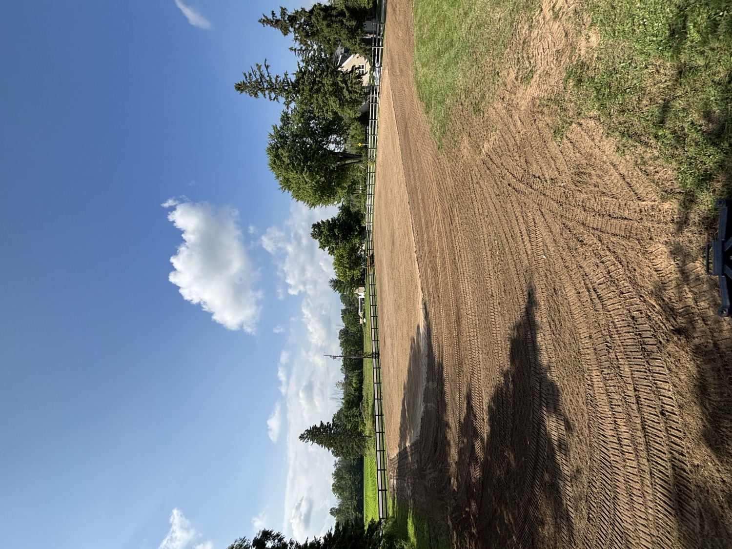 Outdoor riding arena grading