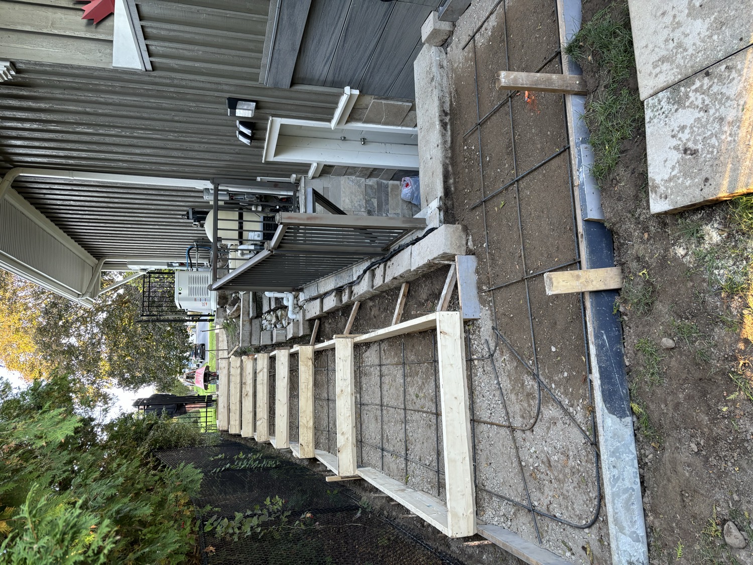 Concrete formwork alongside a building