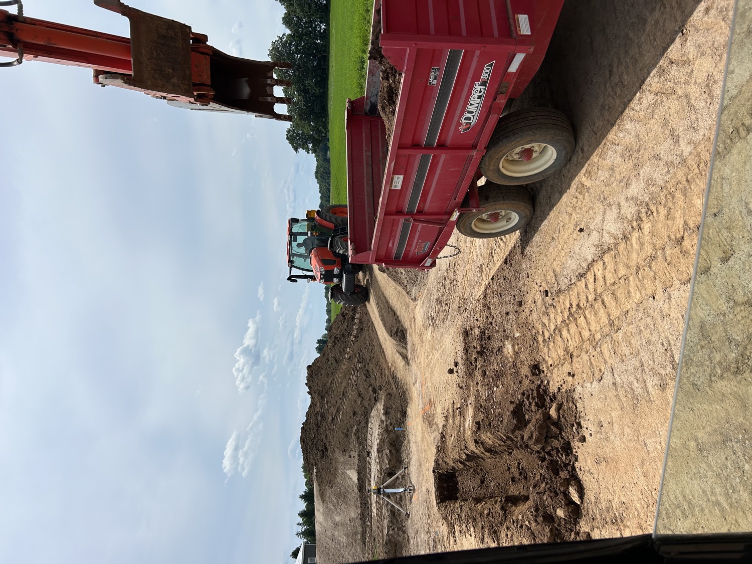 Excavator and dump trailer