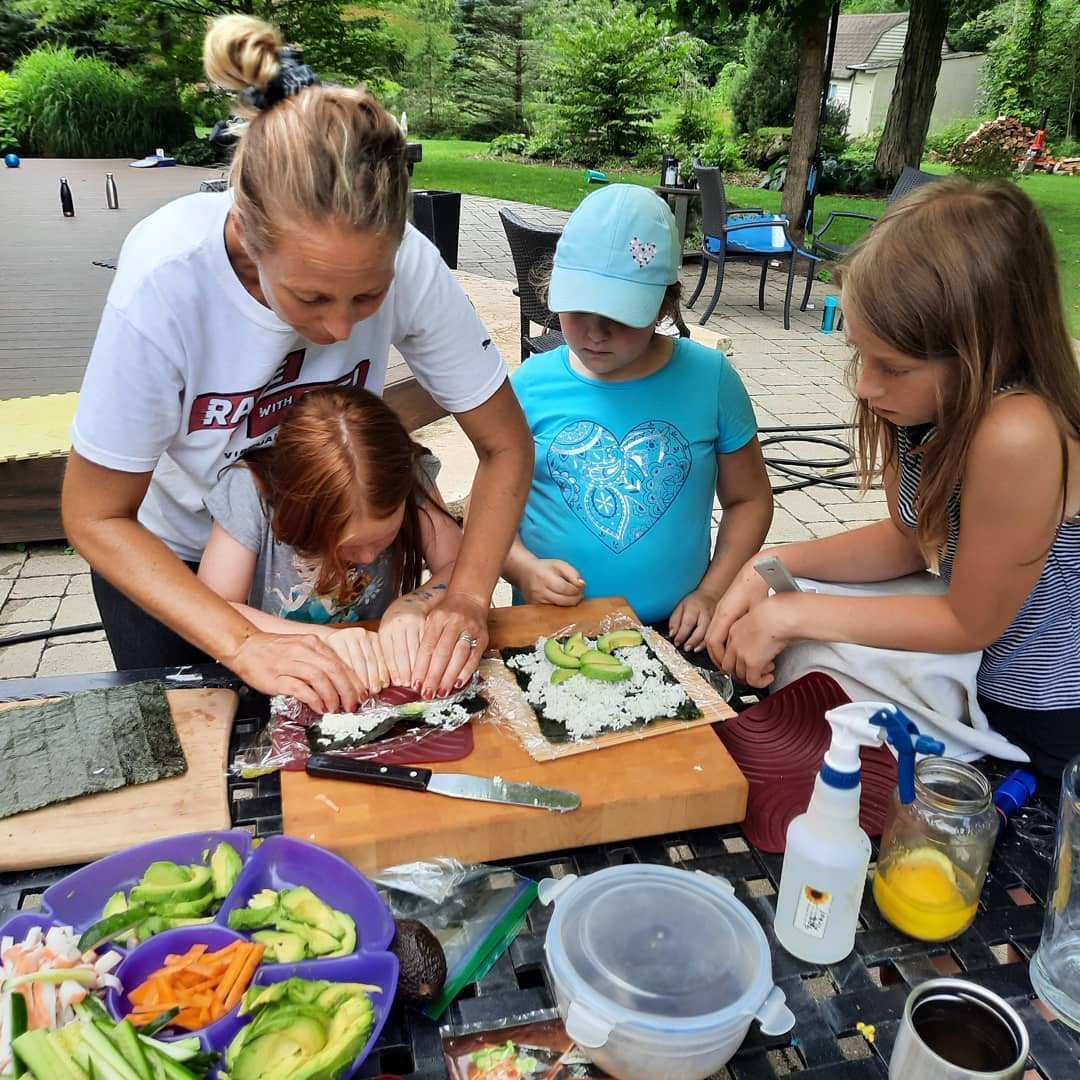 Campers making sushi at Fun on the Farm