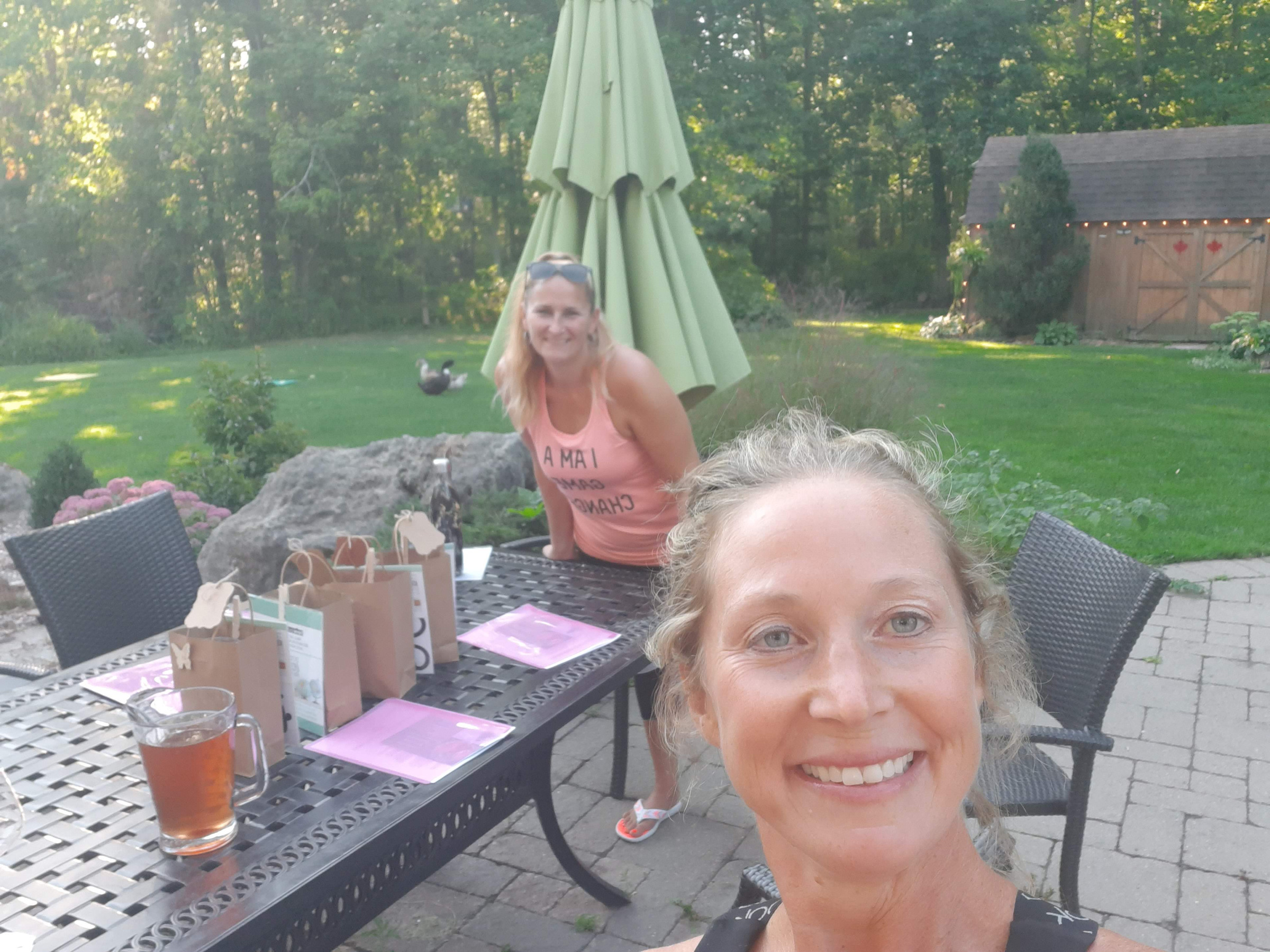 Kaley at an outdoor workshop table