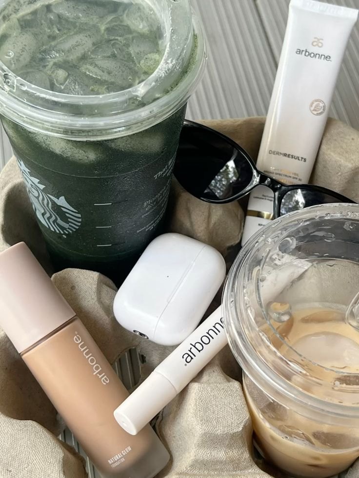 Arbonne skincare and makeup in a tote bag